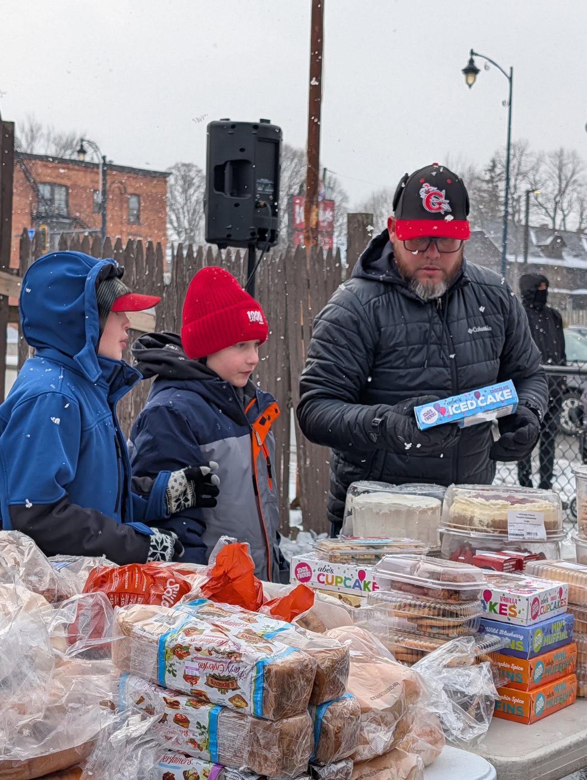 Team running a bake sale fundraiser