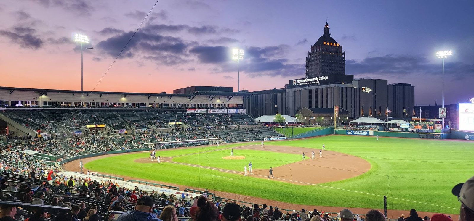 Sunset view of a minor league ballpark