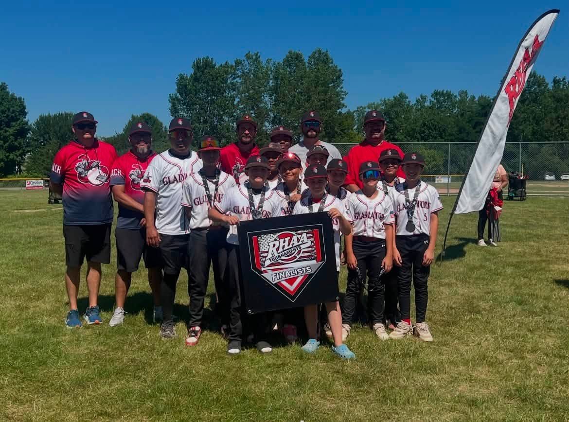 Team posing with the RHAA Tournaments Finalists banner